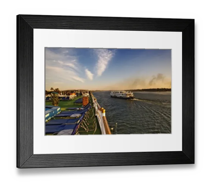 Framed Print : Cruise ships passing on the Nile River, near Aswan, Egypt Framed Print : Cruise ships passing on the Nile River, near Aswan, Egypt