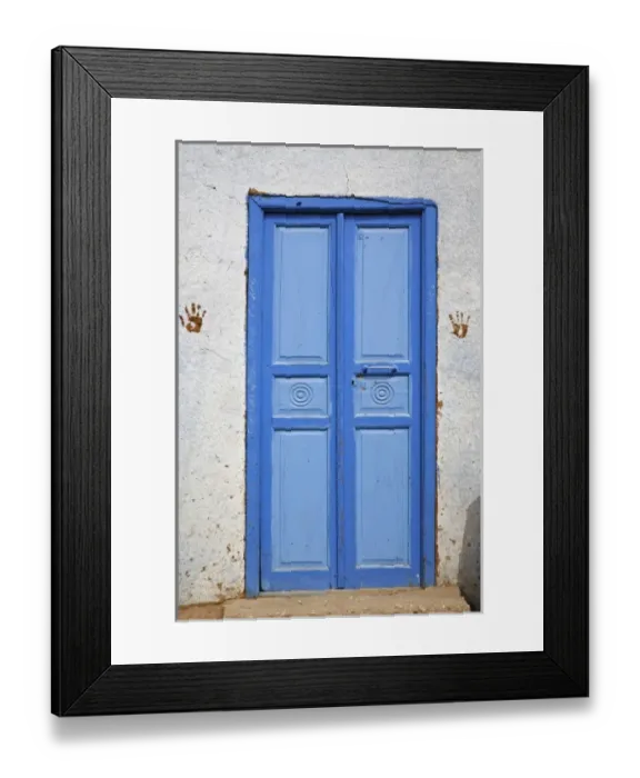 Framed Print : Hand prints on each side of blue doorway. Small rural village outside of Luxor, Egypt Framed Print : Hand prints on each side of blue doorway. Small rural village outside of Luxor, Egypt