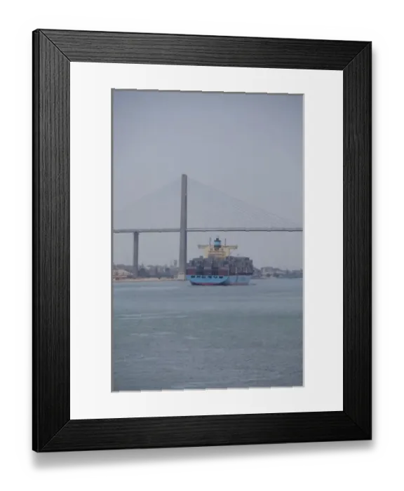 Framed Print : Egypt, Suez Canal. Cargo ship passing under Bridge of Peace (aka Peace Bridge)