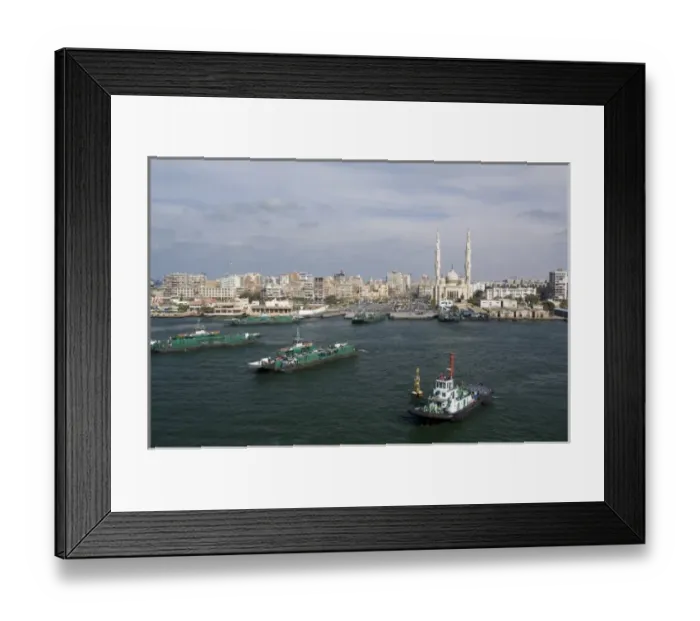 Framed Print : Egypt, Suez Canal. Typical canal views, auto ferry that takes passengers from Aisa to Africa Framed Print : Egypt, Suez Canal. Typical canal views, auto ferry that takes passengers from Aisa to Africa