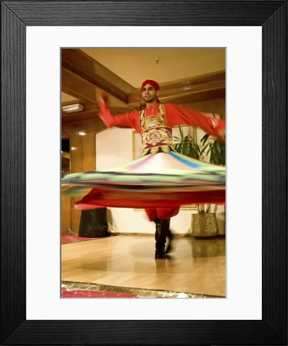 Framed Print : Egypt, Cairo. Whirling dervish dazzling GCT audience on Nubian Night aboard MS River Framed Print : Egypt, Cairo. Whirling dervish dazzling GCT audience on Nubian Night aboard MS River