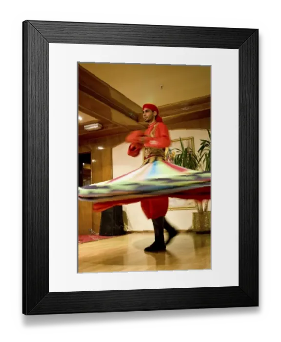Framed Print : Egypt, Cairo. Whirling dervish dazzling GCT audience on Nubian Night aboard MS River