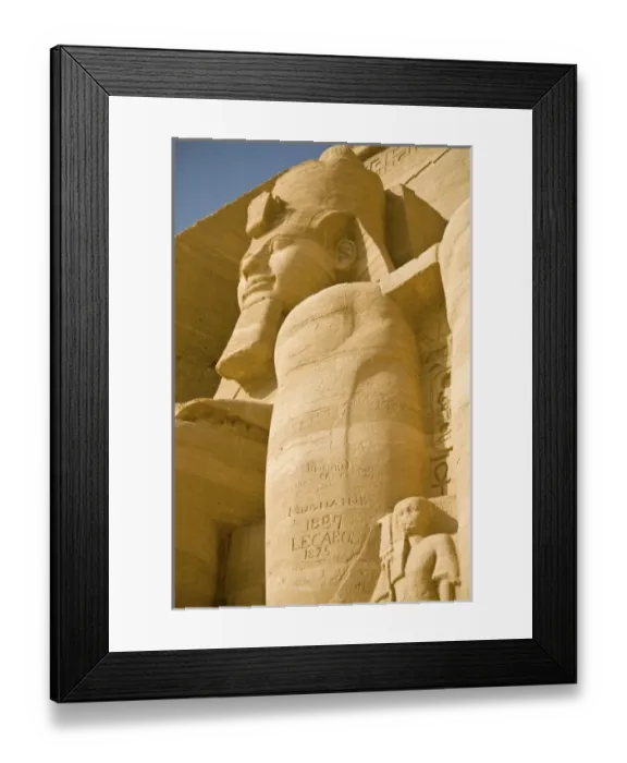 Framed Print : Egypt, Aswan. 19th century grafitti on Colossus of Ramses II at entrance of Abu Simbel Framed Print : Egypt, Aswan. 19th century grafitti on Colossus of Ramses II at entrance of Abu Simbel