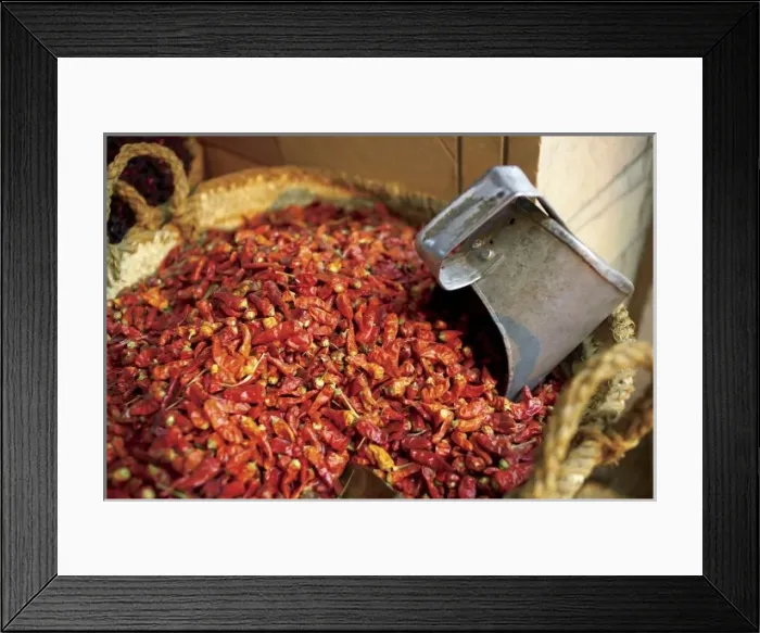 Framed Print : Egypt, Cairo, Souk Market, Hot red peppers with a scoop in them at a vendor selling Spices Framed Print : Egypt, Cairo, Souk Market, Hot red peppers with a scoop in them at a vendor selling Spices