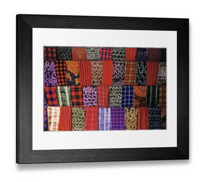Framed Print : Africa, Kenya, Msai Mara. A colorful display of fabrics and cloth of the Msai Framed Print : Africa, Kenya, Msai Mara. A colorful display of fabrics and cloth of the Msai