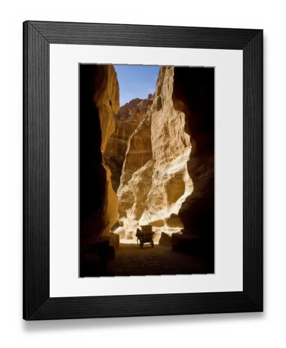 Framed Print : Jordan, Petra. A horse-drawn carriage in the Siq which leads to the fabled Hidden Framed Print : Jordan, Petra. A horse-drawn carriage in the Siq which leads to the fabled Hidden