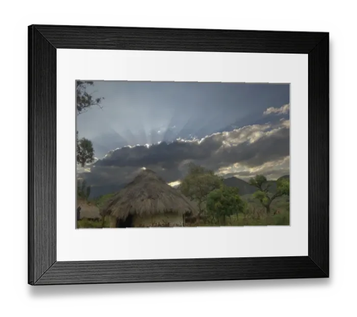 Framed Print : Africa, Ethiopia, Regia region, Bargoba village. Streaks of sunlight stream from behind clouds Framed Print : Africa, Ethiopia, Regia region, Bargoba village. Streaks of sunlight stream from behind clouds