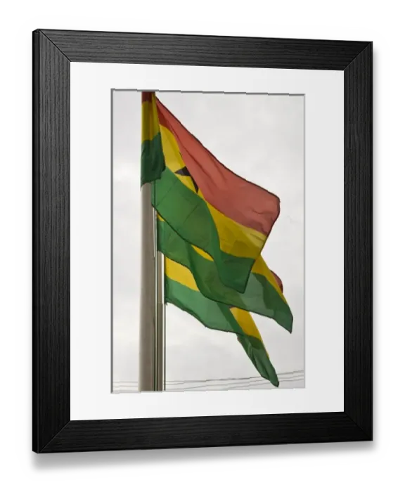 Framed Print : Africa, West Africa, Ghana, Accra. Close-up of Ghanaian flags blowing in wind