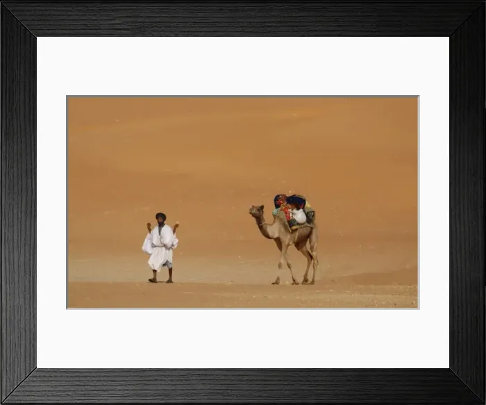 Framed Print : Mauritania, Route Espoir, Boutuilimit, A man with his dromedary