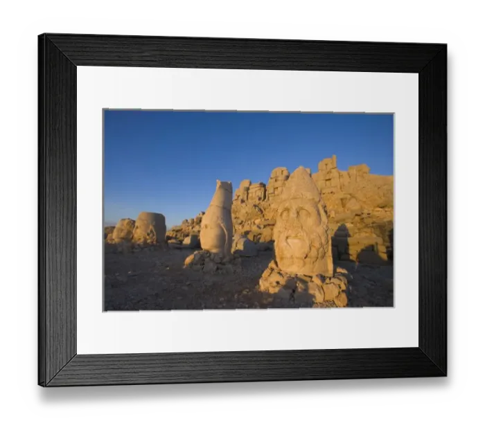 Framed Print : Colossal head statues of Gods guarding the tumulus of king Antiochus I Theos of Commagene