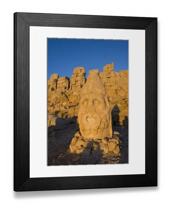 Framed Print : Colossal head statues of Gods guarding the tumulus of king Antiochus I Theos of Commagene