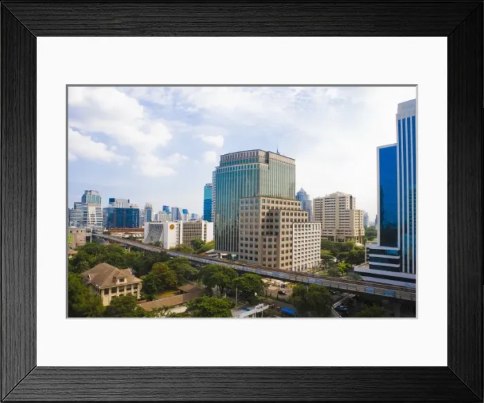 Framed Print : Bangkok, Thailand - The downtown buildings of a city and residential area are separated