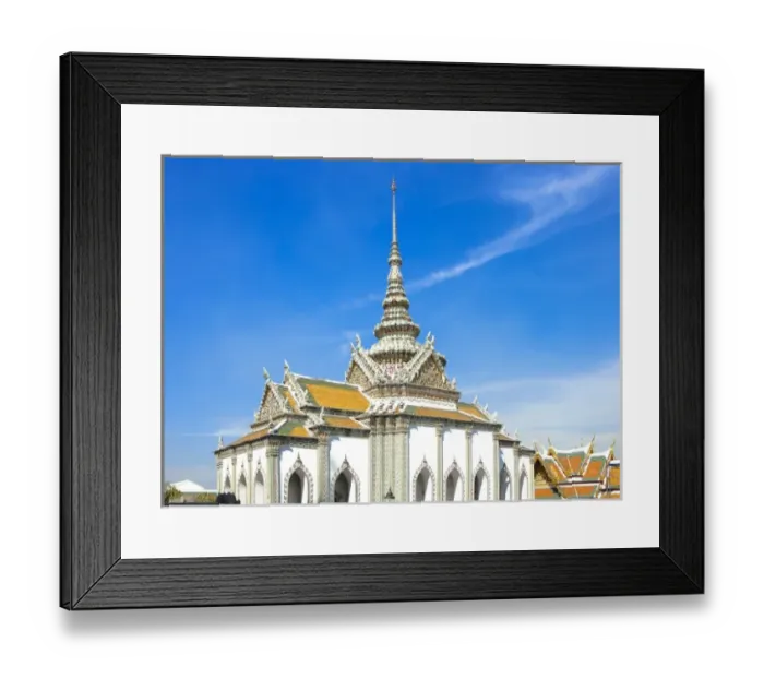 Framed Print : Bangkok, Thailand - A Buddhist temple with an ornately decorated roof and white walls Framed Print : Bangkok, Thailand - A Buddhist temple with an ornately decorated roof and white walls