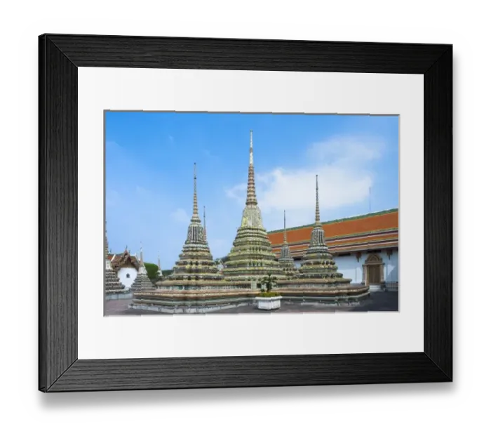 Framed Print : Bangkok, Thailand - Three ground-level spires featured prominently within a Buddhist temple