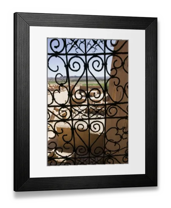 Framed Print : MOROCCO, South of the High Atlas, OUARZAZATE: Taourirt Kasbah viewed through lattice Framed Print : MOROCCO, South of the High Atlas, OUARZAZATE: Taourirt Kasbah viewed through lattice