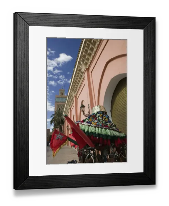 Framed Print : MOROCCO, MARRAKECH: Kasbah Mosque (Kasbah=Royal Quarter) Exterior and waterboy hat Framed Print : MOROCCO, MARRAKECH: Kasbah Mosque (Kasbah=Royal Quarter) Exterior and waterboy hat