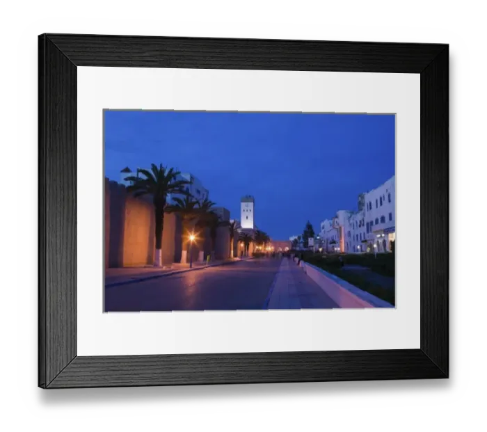 Framed Print : MOROCCO, Atlantic Coast, ESSAOUIRA: Avenue Oqba Ben Nafli / Evening Framed Print : MOROCCO, Atlantic Coast, ESSAOUIRA: Avenue Oqba Ben Nafli / Evening