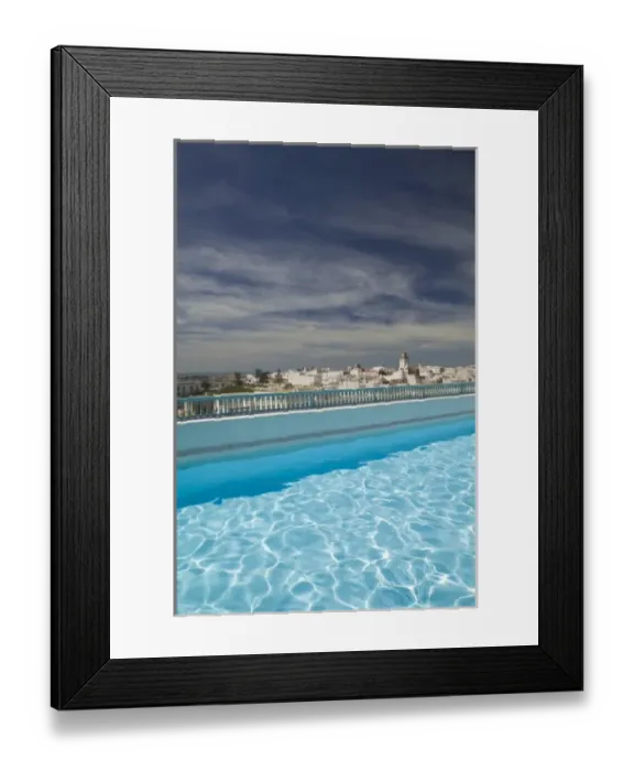 Framed Print : MOROCCO, Atlantic Coast, ESSAOUIRA: Town and Pool View from Hotel L Heure Bleue Framed Print : MOROCCO, Atlantic Coast, ESSAOUIRA: Town and Pool View from Hotel L Heure Bleue