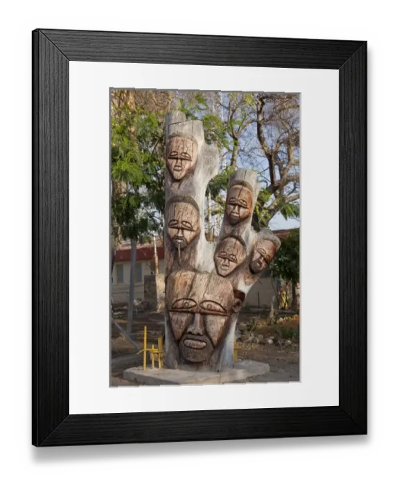 Framed Print : Namibia, Lake Otjikoto. Close-up of wooden carving at the entrance to the lake