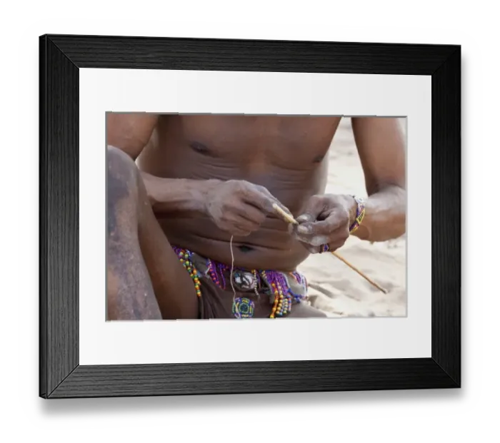 Framed Print : Africa, Namibia, Bushmanland, Nhoma. Bushmans hands wraps an arrow shaft with twine Framed Print : Africa, Namibia, Bushmanland, Nhoma. Bushmans hands wraps an arrow shaft with twine