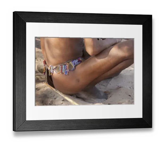 Framed Print : Africa, Namibia, Bushmanland, Nhoma. Details of a squatting Bushman hunters loin cloth Framed Print : Africa, Namibia, Bushmanland, Nhoma. Details of a squatting Bushman hunters loin cloth