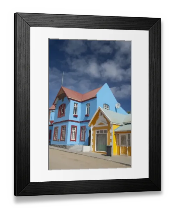 Framed Print : Africa, Namibia, Luderitz. Colorful German style houses along Berg Street Framed Print : Africa, Namibia, Luderitz. Colorful German style houses along Berg Street