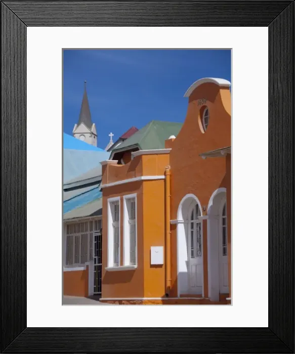 Framed Print : Africa, Namibia, Luderitz. Colorful German style houses along Berg Street, historic Framed Print : Africa, Namibia, Luderitz. Colorful German style houses along Berg Street, historic