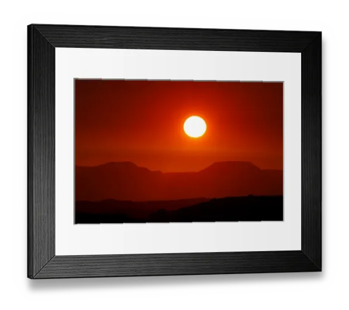 Framed Print : Africa, Namibia, Damaraland. After a scorching day the sun sets over the Table Mountains