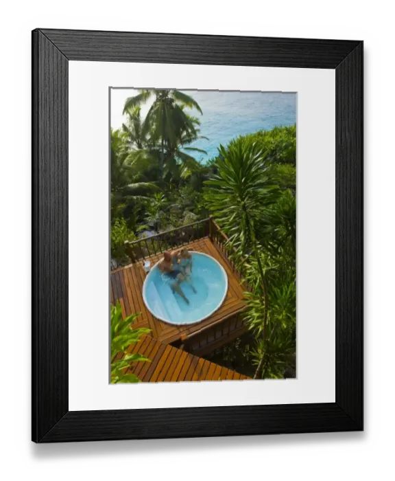 Framed Print : Couple enjoying hot tub at Fregate Resort (MR) (PR)