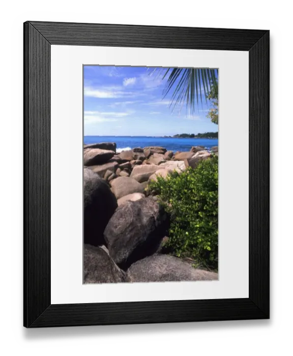 Framed Print : Beautiful rocks and ocean in the beautiful village of La Digue in the Seychelles