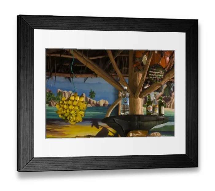 Framed Print : Seychelles, La Digue Island, Grand Anse, hanging bananas at Loutier Coco beach cafe