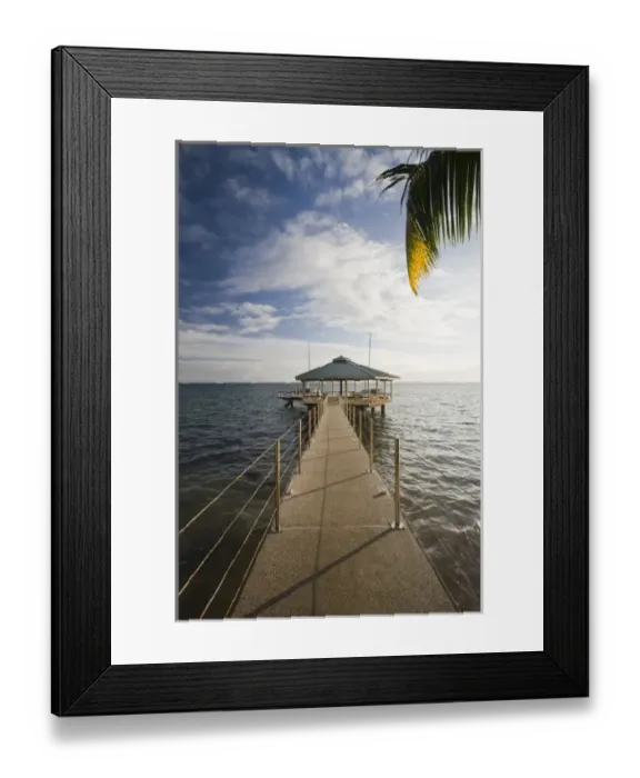Framed Print : Seychelles, Praslin Island, Anse Bois de Rose, pier at Coco de Mer Hotel