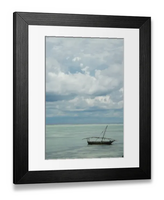 Framed Print : Tanzania: Zanzibar, view of Indian Ocean and local fishing boat from Matamwe Beach Framed Print : Tanzania: Zanzibar, view of Indian Ocean and local fishing boat from Matamwe Beach