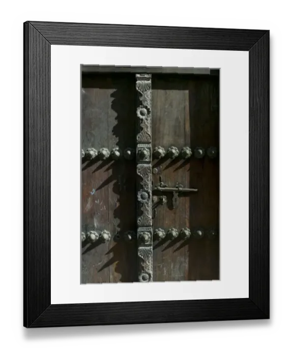 Framed Print : Africa, Tanzania, Zanzibar, Stone Town, Morning sun lights elaborately carved wooden