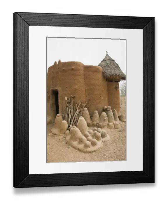 Framed Print : West Africa, Africa, Togo, Tamberma Region. Batammariba fetish objects against traditional Framed Print : West Africa, Africa, Togo, Tamberma Region. Batammariba fetish objects against traditional