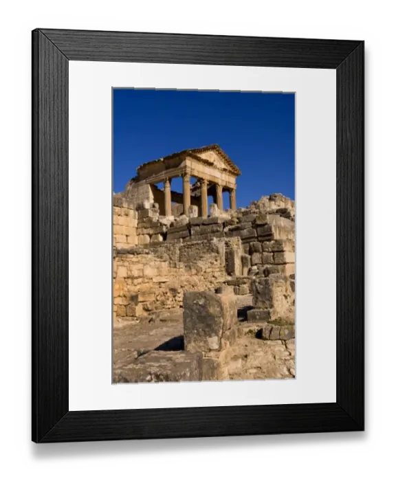 Framed Print : Forum and Capitol Temple in historical 2nd Century Roman ruins in Dougga in Tunisia