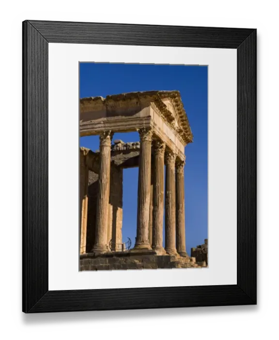 Framed Print : Forum and Capitol Temple in historical 2nd Century Roman ruins in Dougga in Tunisia Framed Print : Forum and Capitol Temple in historical 2nd Century Roman ruins in Dougga in Tunisia