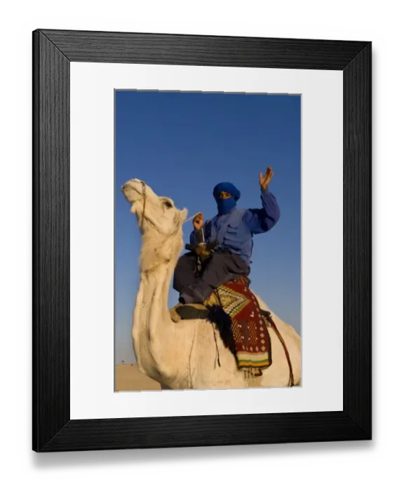 Framed Print : Local Bedouin man on camel ride in Douz in Sahara Desert in Tunisia Africa Framed Print : Local Bedouin man on camel ride in Douz in Sahara Desert in Tunisia Africa