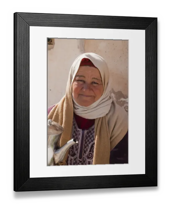 Framed Print : Tunisia, Ksour Area, Metameur, middle-aged Tunisian woman serving tea (MR) Framed Print : Tunisia, Ksour Area, Metameur, middle-aged Tunisian woman serving tea (MR)