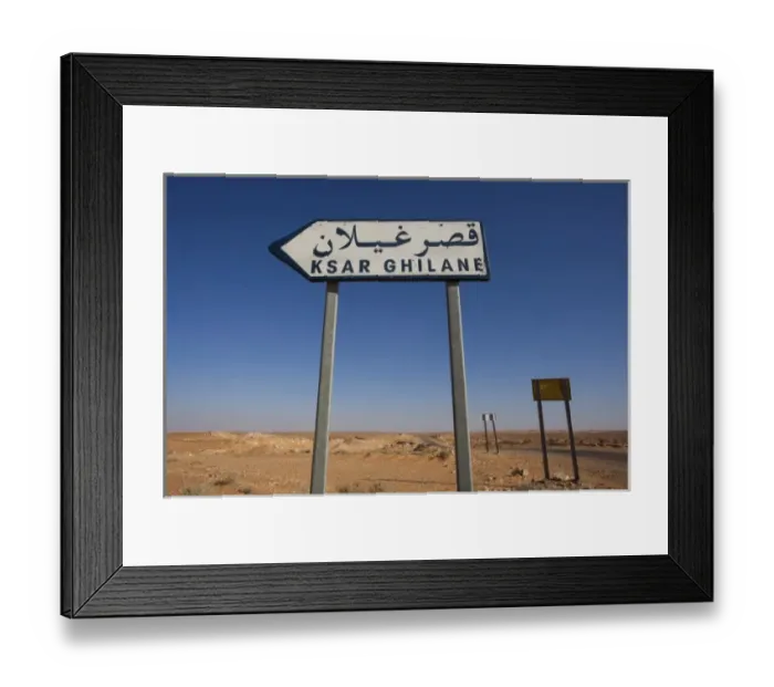 Framed Print : Tunisia, Ksour Area, Ksar Ghilane, Grand Erg Oriental Desert, road sign