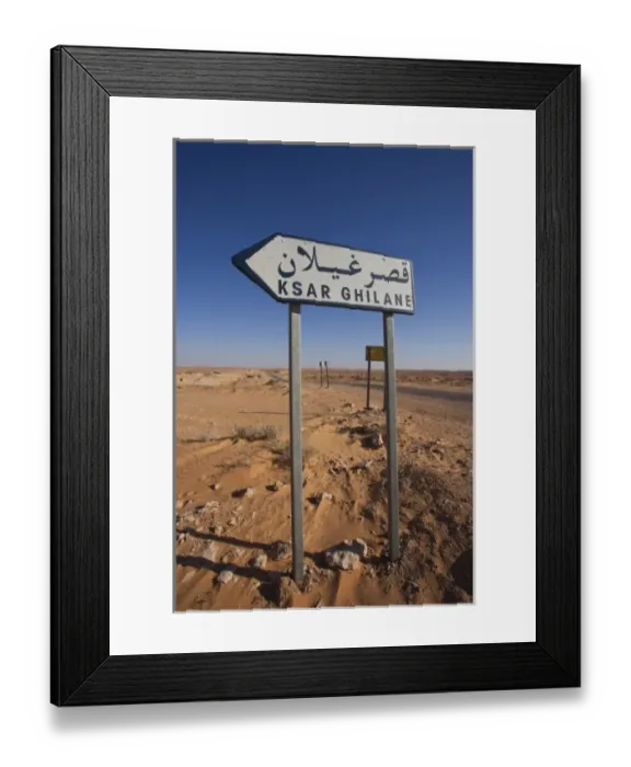 Framed Print : Tunisia, Ksour Area, Ksar Ghilane, Grand Erg Oriental Desert, road sign Framed Print : Tunisia, Ksour Area, Ksar Ghilane, Grand Erg Oriental Desert, road sign