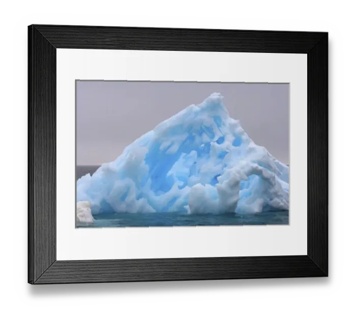 Framed Print : pinnacle iceberg floating off the western Antarctic peninsula, Antarctica, Southern Ocean Framed Print : pinnacle iceberg floating off the western Antarctic peninsula, Antarctica, Southern Ocean