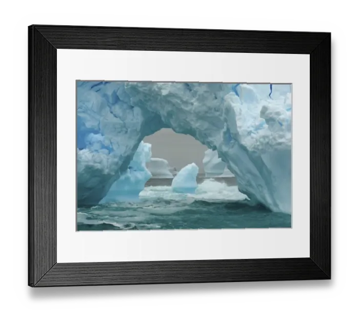 Framed Print : arched iceberg floating off the western Antarctic peninsula, Antarctica, Southern Ocean Framed Print : arched iceberg floating off the western Antarctic peninsula, Antarctica, Southern Ocean
