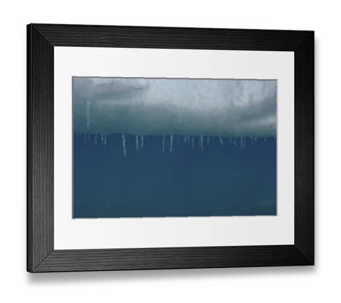 Framed Print : water dripping from icicles hanging along an iceberg, western Antarctic peninsula