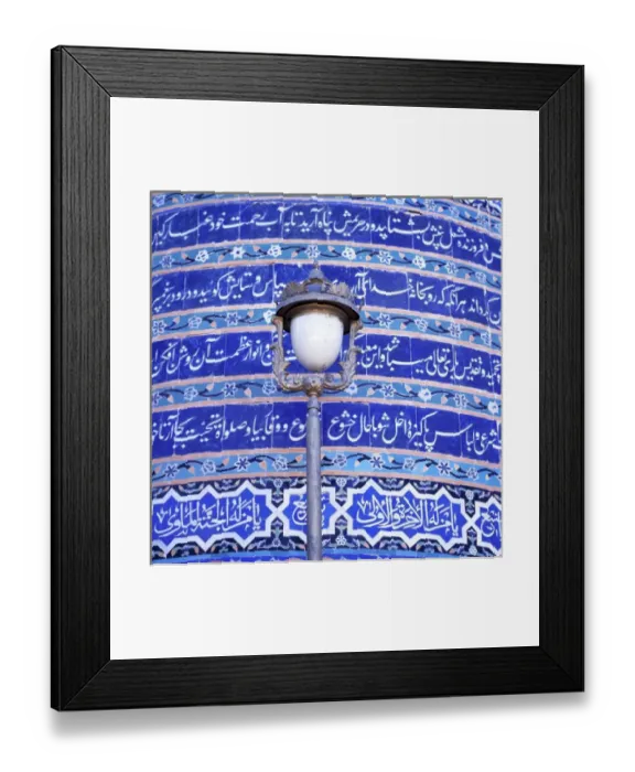Framed Print : Afghanistan, Herat. An ornate street lamp stands out against the blue-tiled wall Framed Print : Afghanistan, Herat. An ornate street lamp stands out against the blue-tiled wall