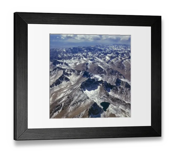 Framed Print : The Koh-i-Baba spur of the Hindu Kush Mountains rises between Herat and Mazar-i-Sharif, Afghanistan Framed Print : The Koh-i-Baba spur of the Hindu Kush Mountains rises between Herat and Mazar-i-Sharif, Afghanistan