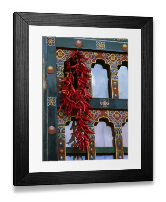 Framed Print : Chili peppers adorn many houses in Bhutan and are used in cooking many dishes