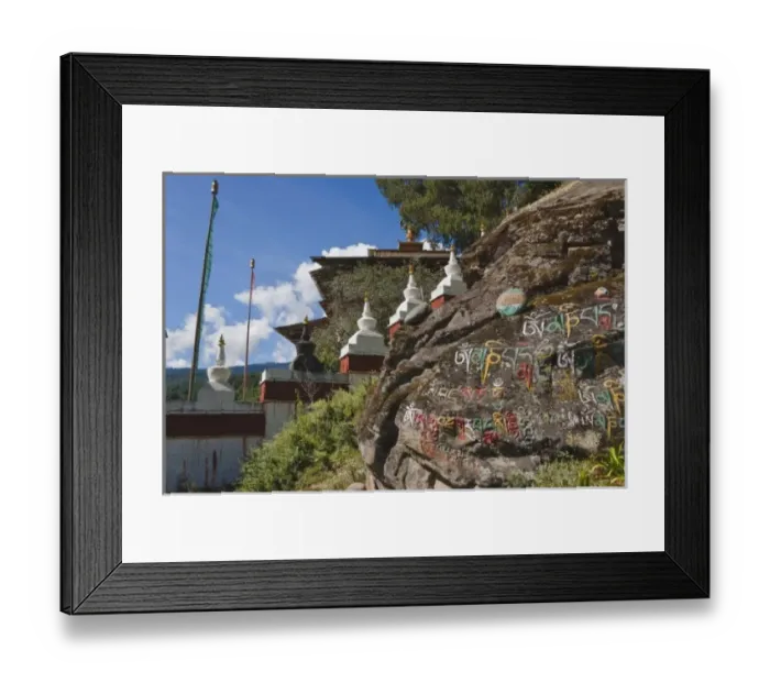 Framed Print : Bhutanese writing on rocks and Nepalese chortens, Kurje Lhakhang, Bumthang, Bhutan Framed Print : Bhutanese writing on rocks and Nepalese chortens, Kurje Lhakhang, Bumthang, Bhutan