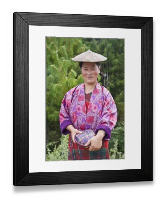 Framed Print : Portrait of a farmer wearing bamboo hat, Bumthang, Bhutan. (MR) Framed Print : Portrait of a farmer wearing bamboo hat, Bumthang, Bhutan. (MR)