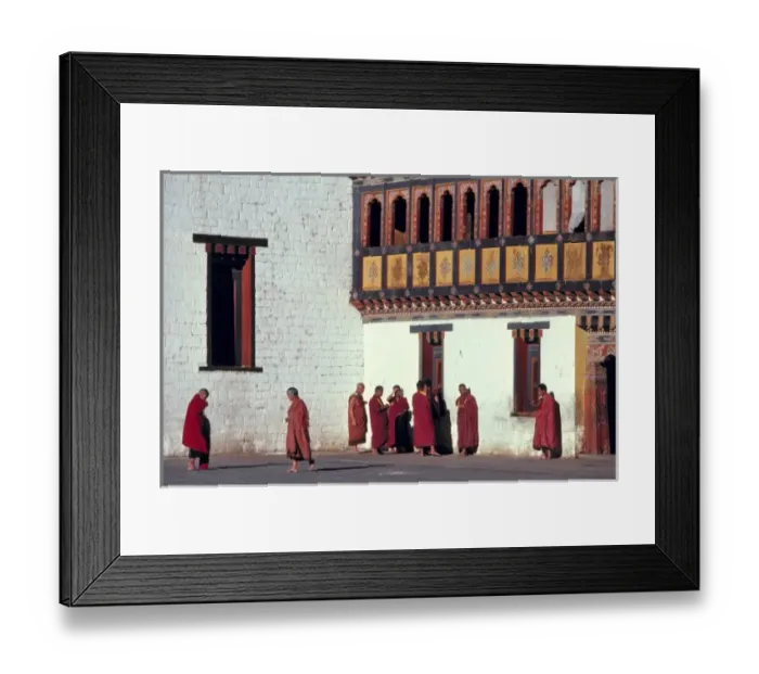 Framed Print : Bhutan, Thimphu. The monks crimson robes stand in brilliant contrast to